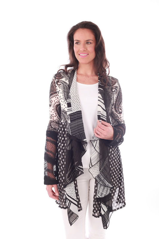 Black and white mesh cardigan with front draping. Mixed prints of stripes, polka dots, and paisley. 